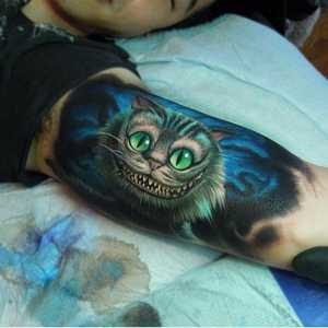 „Cheshire Cat“ - tetování s kladnou hodnotou pro optimistických lidí