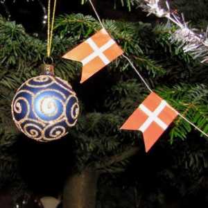 Vánoční věnec vlajek s rukama